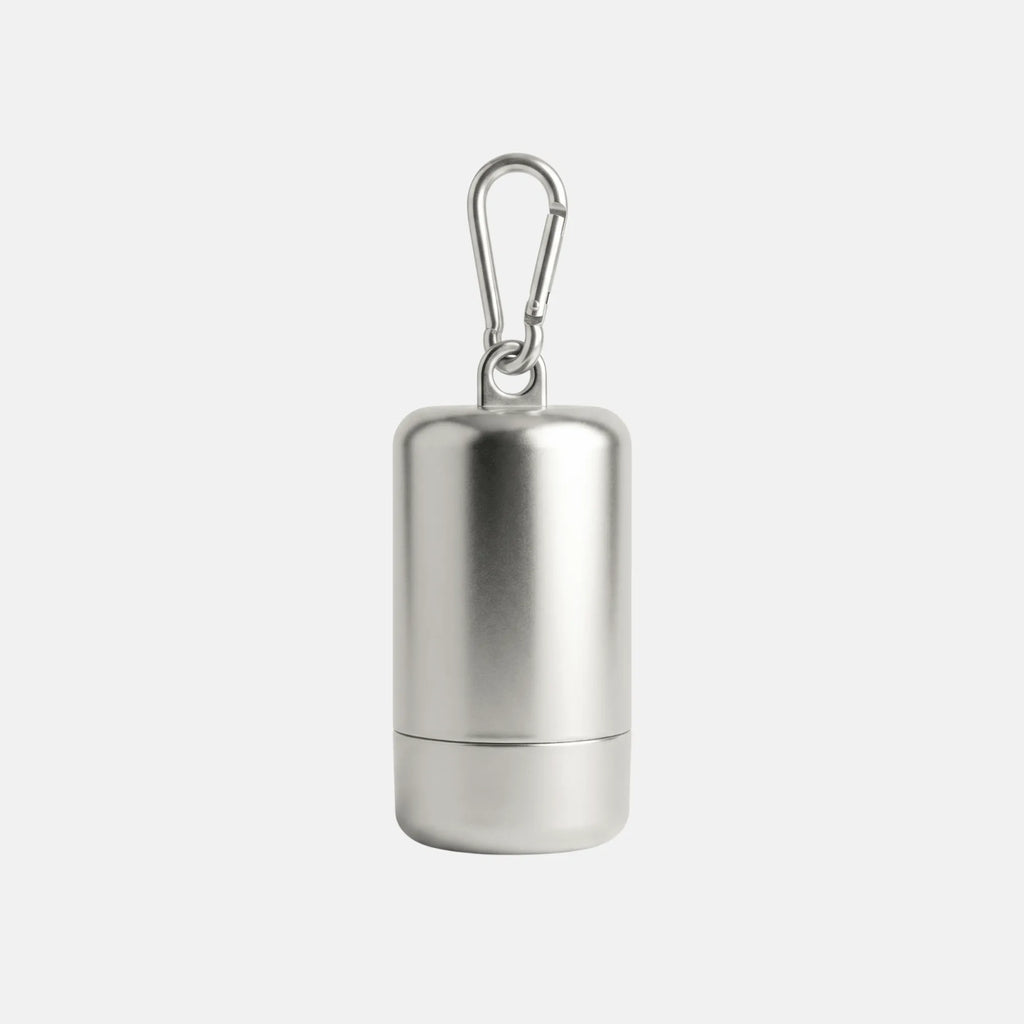 Glint silver poop bag holder with matching silver poop bags by Jamie Dogwear.
