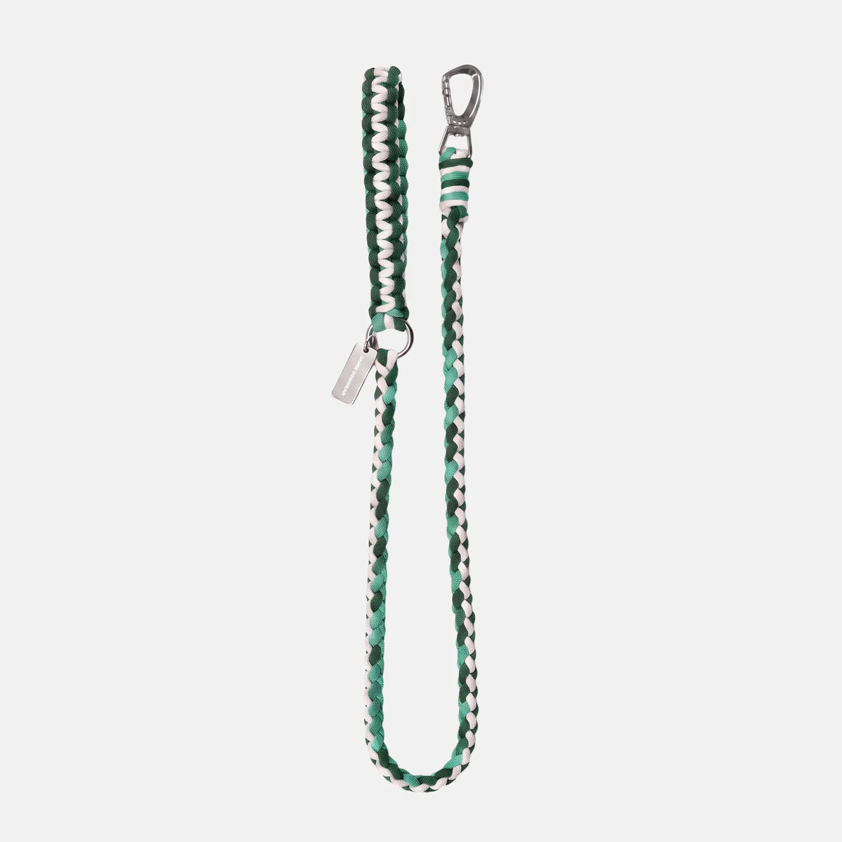 Handmade Strata braided dog lead in fern, featuring green and white paracord by Jamie Dogwear.
