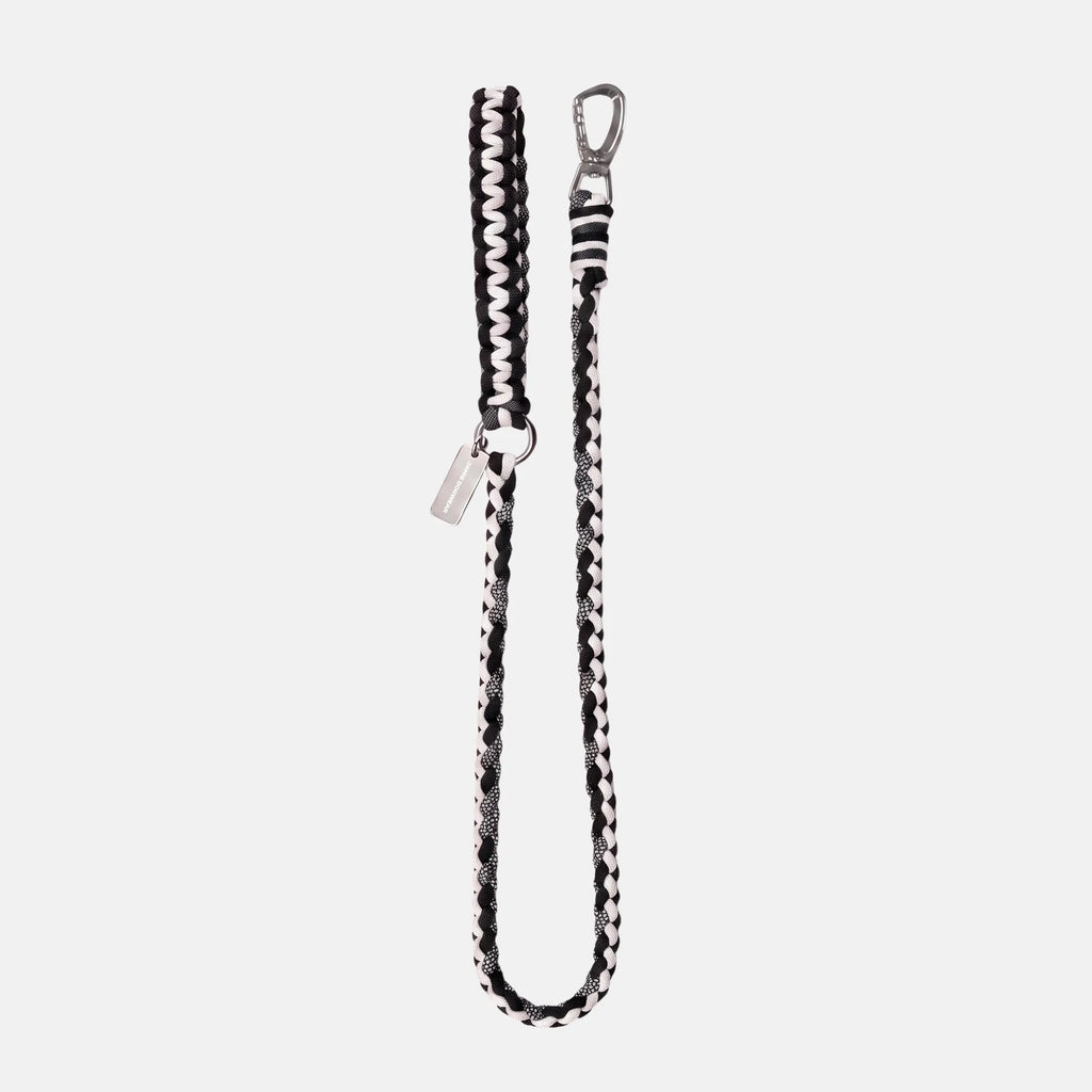 Handmade Strata braided dog lead in Onyx, featuring black and white paracord by Jamie Dogwear.